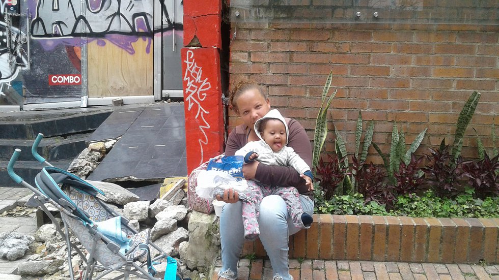 bogota-venezuela-poverty-street-child-woman-migration-venezuelan-alms-need-homeless-informal-work-recreation-road-play-girl-fun-vacation-1460005.jpg