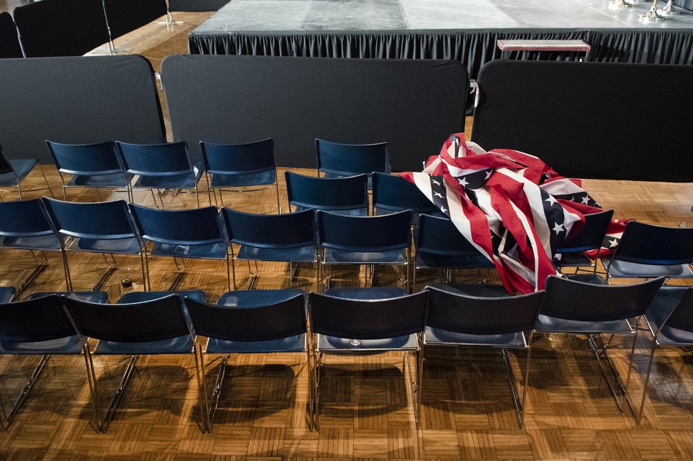 The party is over. A flag banner lies crumbled up on chairs at the end of the Joe Biden event at the Olmsted Center at Drake University.