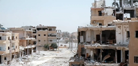 Destroyed_neighborhood_in_Raqqa.png