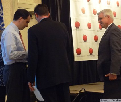Scott Walker confers with Bob Reber, Treasurer of WCVSF, while lobbyist and former Senator Bob Welch looks on.