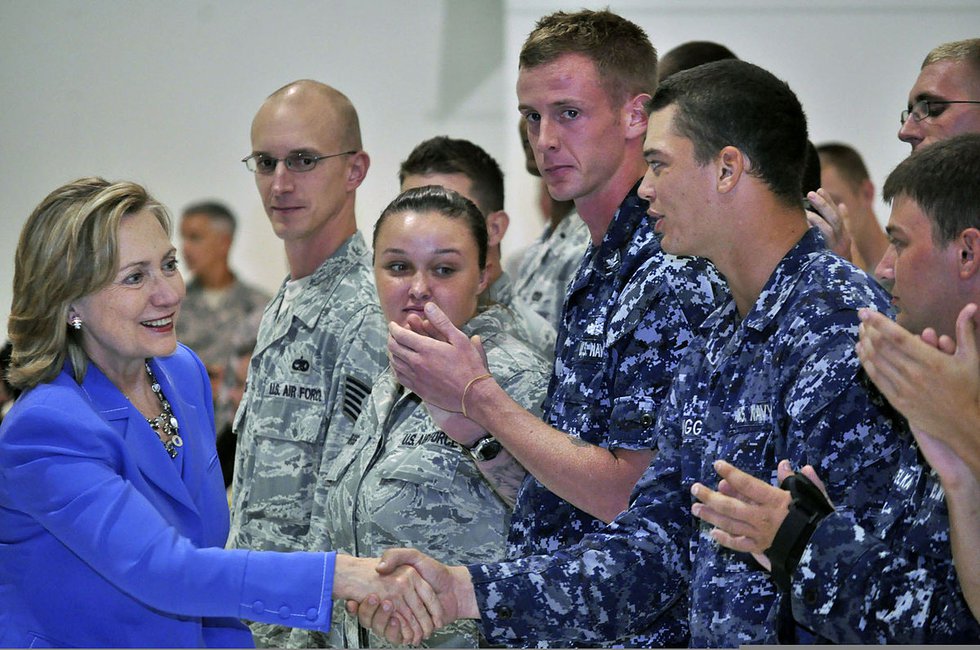 1200px-U.S._Secretary_of_State_Hillary_Rodham_Clinton,_left,_greets_Service_members_after_her_speech_at_Andersen_Air_Force_Base,_Guam_101029-N-QE566-002.jpg.jpe