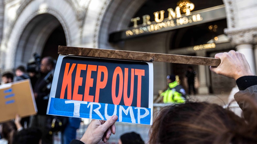 Keep_Out_Trump,_Protesters_outside_Trump_Hotel_on_Pennsylvania_Ave,_DC_(30816244091).jpg