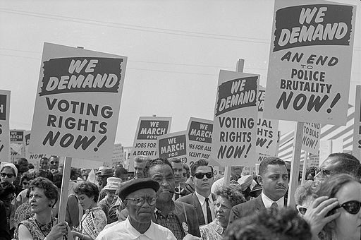 Marchers_with_signs_at_the_March_on_Washington,_1963.jpg